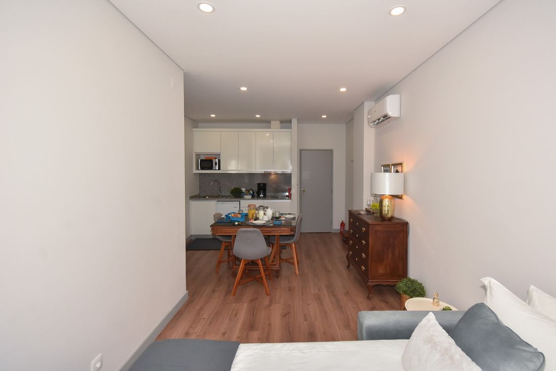 Blue Foz — The living room, kitchen at the far end