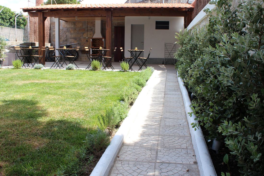 The lawn and the pergola at the far end