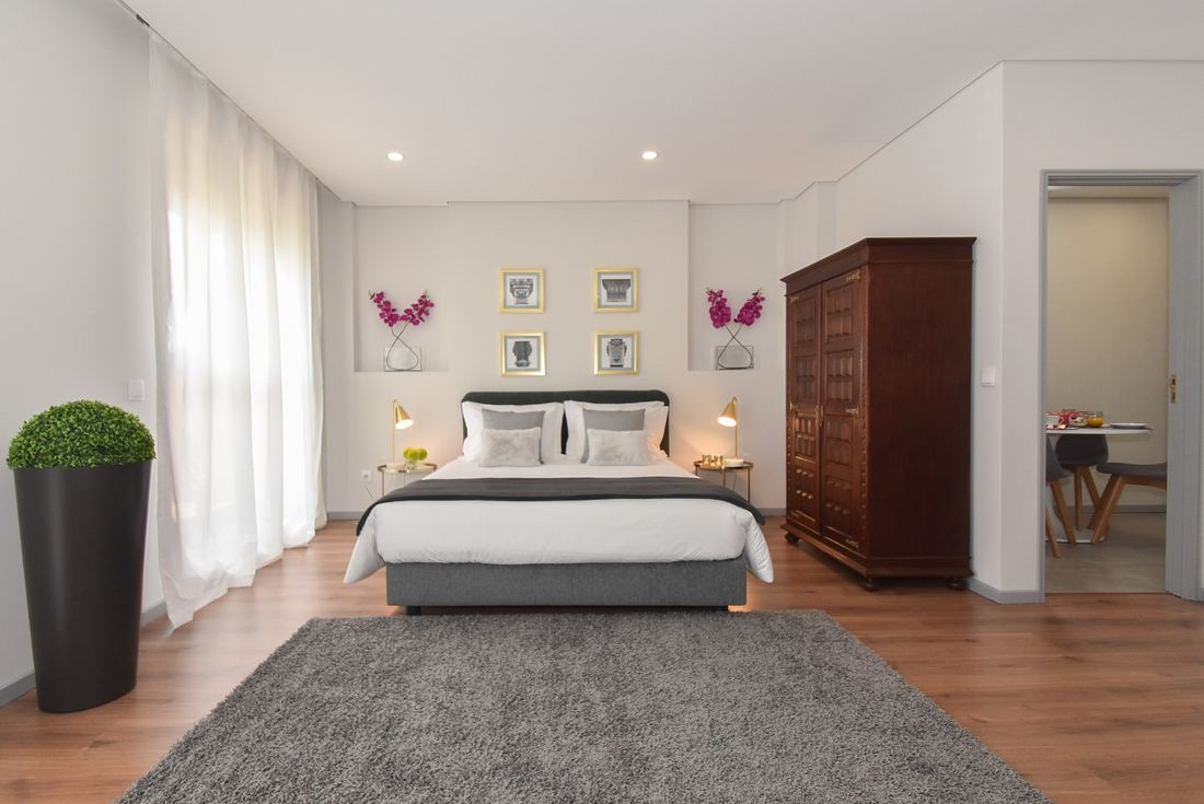 Pink Cedofeita — The bed and the restored wardrobe